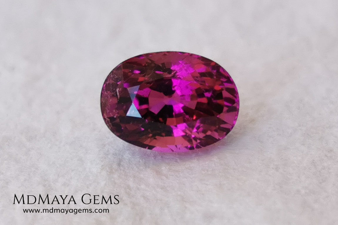 Intense Reddish Purple Rubellite 1.21 ct. Oval Cut. African Tourmaline. This gemstone has a saturated pink color. This little gem has the best color of rubellites, under the natural light you can see a very intense pink. It will look fab in a ring, this pink gemstone shines by itself.