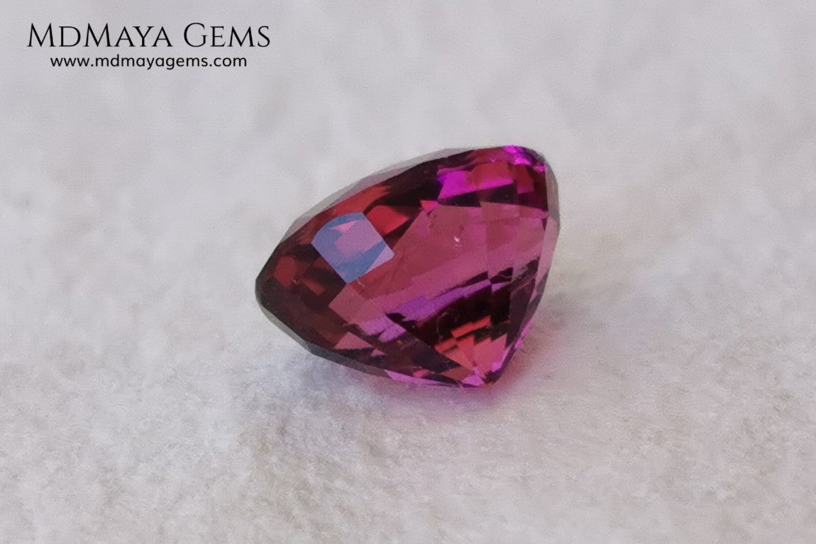 Intense Reddish Purple Rubellite 1.21 ct. Oval Cut. African Tourmaline. This gemstone has a saturated pink color. This little gem has the best color of rubellites, under the natural light you can see a very intense pink. It will look fab in a ring, this pink gemstone shines by itself.