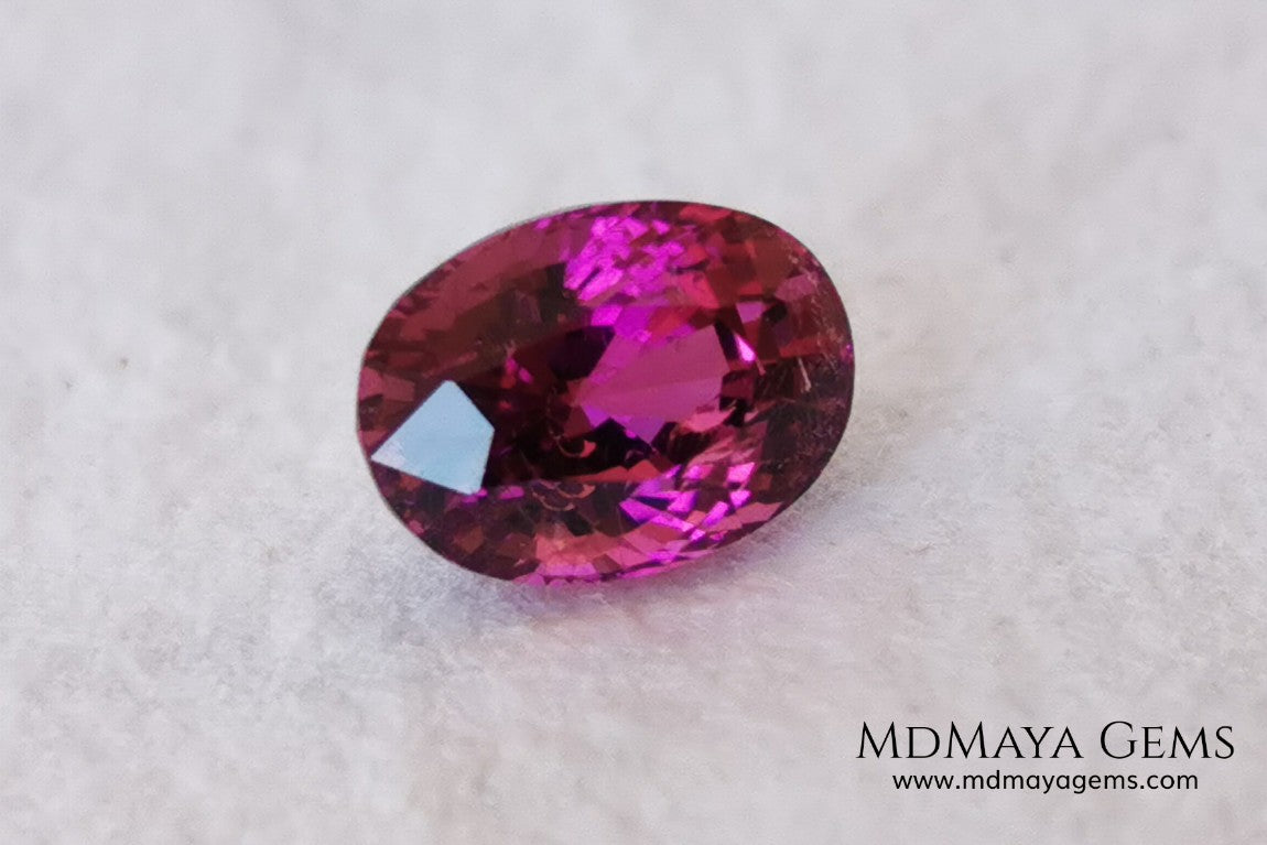 Intense Reddish Purple Rubellite 1.21 ct. Oval Cut. African Tourmaline. This gemstone has a saturated pink color. This little gem has the best color of rubellites, under the natural light you can see a very intense pink. It will look fab in a ring, this pink gemstone shines by itself.