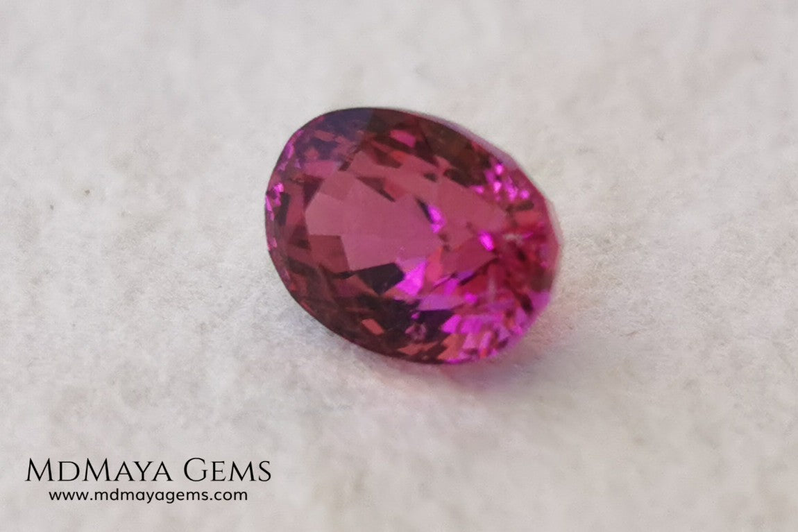 Intense Reddish Purple Rubellite 1.21 ct. Oval Cut. African Tourmaline. This gemstone has a saturated pink color. This little gem has the best color of rubellites, under the natural light you can see a very intense pink. It will look fab in a ring, this pink gemstone shines by itself.