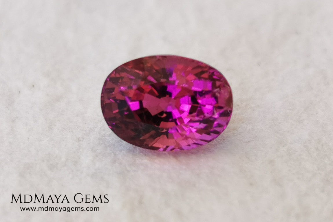 Intense Reddish Purple Rubellite 1.21 ct. Oval Cut. African Tourmaline. This gemstone has a saturated pink color. This little gem has the best color of rubellites, under the natural light you can see a very intense pink. It will look fab in a ring, this pink gemstone shines by itself.