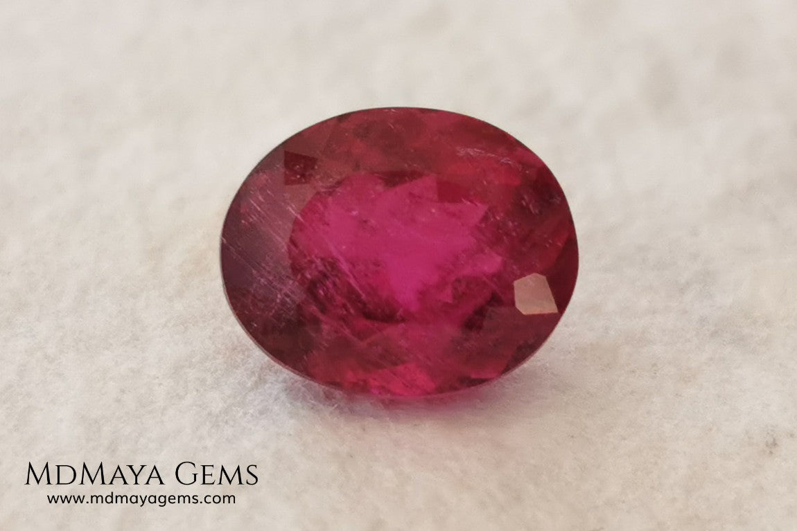 Purplish Red Rubellite Tourmaline. Oval Cut. 2.09 ct. This gem has some inclusions but these don't disturb the appearance of the gem, its color is rich and deep under daylight, is awesome!. It is ideal for a ring. 
