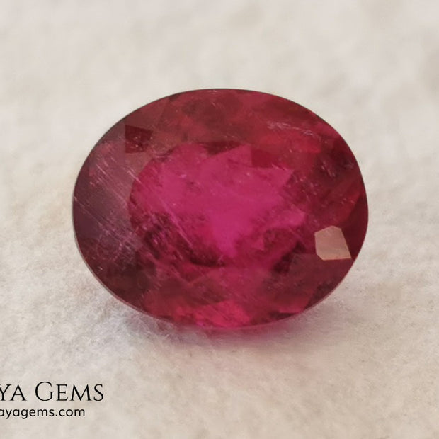 Purplish Red Rubellite Tourmaline. Oval Cut. 2.09 ct. This gem has some inclusions but these don't disturb the appearance of the gem, its color is rich and deep under daylight, is awesome!. It is ideal for a ring. 