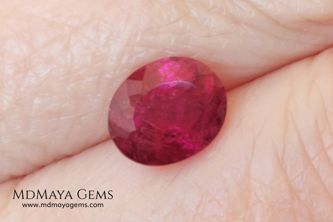 Purplish Red Rubellite Tourmaline. Oval Cut. 2.09 ct. This gem has some inclusions but these don't disturb the appearance of the gem, its color is rich and deep under daylight, is awesome!. It is ideal for a ring. 