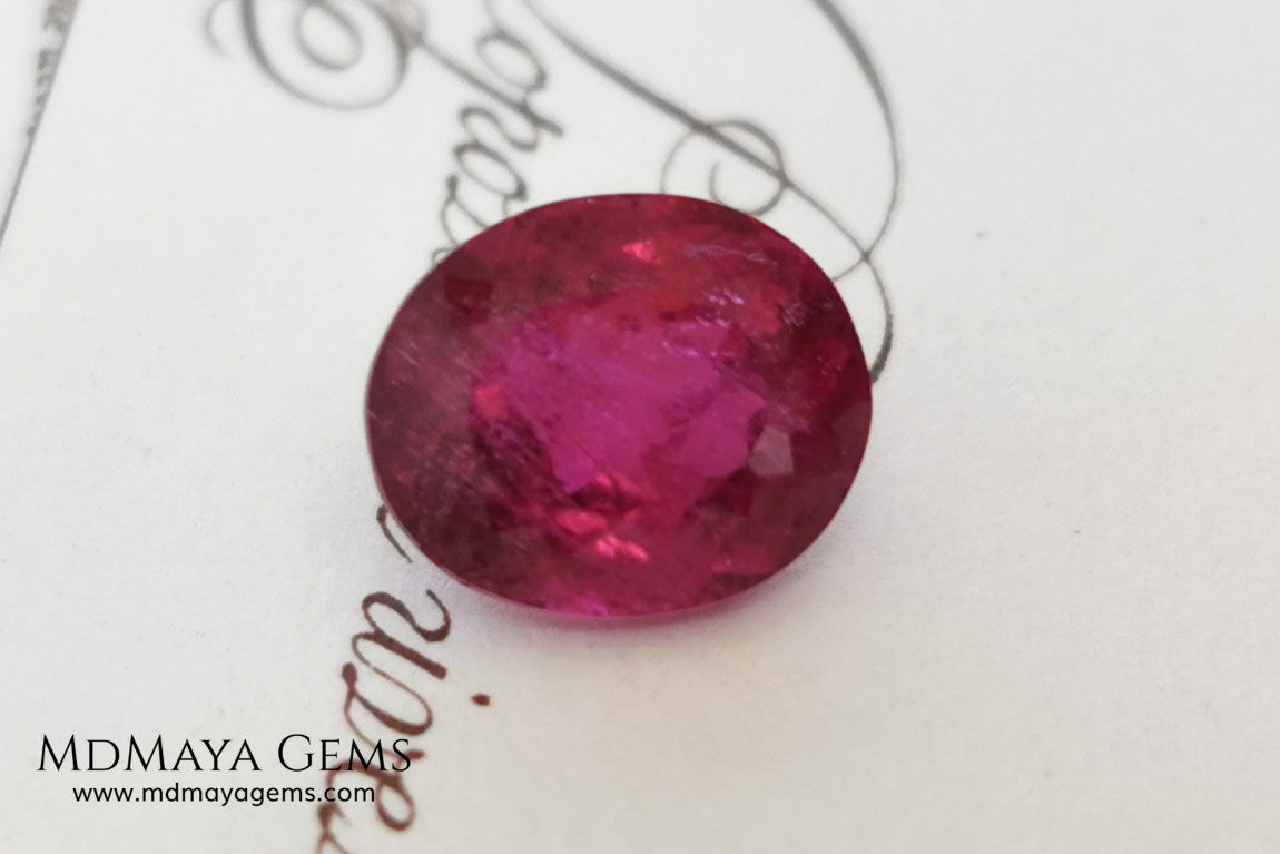 Purplish Red Rubellite Tourmaline. Oval Cut. 2.09 ct. This gem has some inclusions but these don't disturb the appearance of the gem, its color is rich and deep under daylight, is awesome!. It is ideal for a ring. 