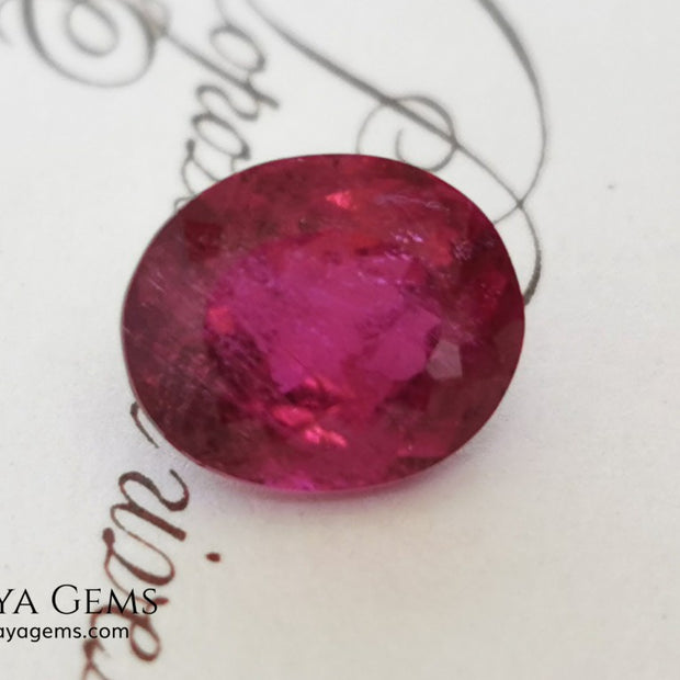 Purplish Red Rubellite Tourmaline. Oval Cut. 2.09 ct. This gem has some inclusions but these don't disturb the appearance of the gem, its color is rich and deep under daylight, is awesome!. It is ideal for a ring. 
