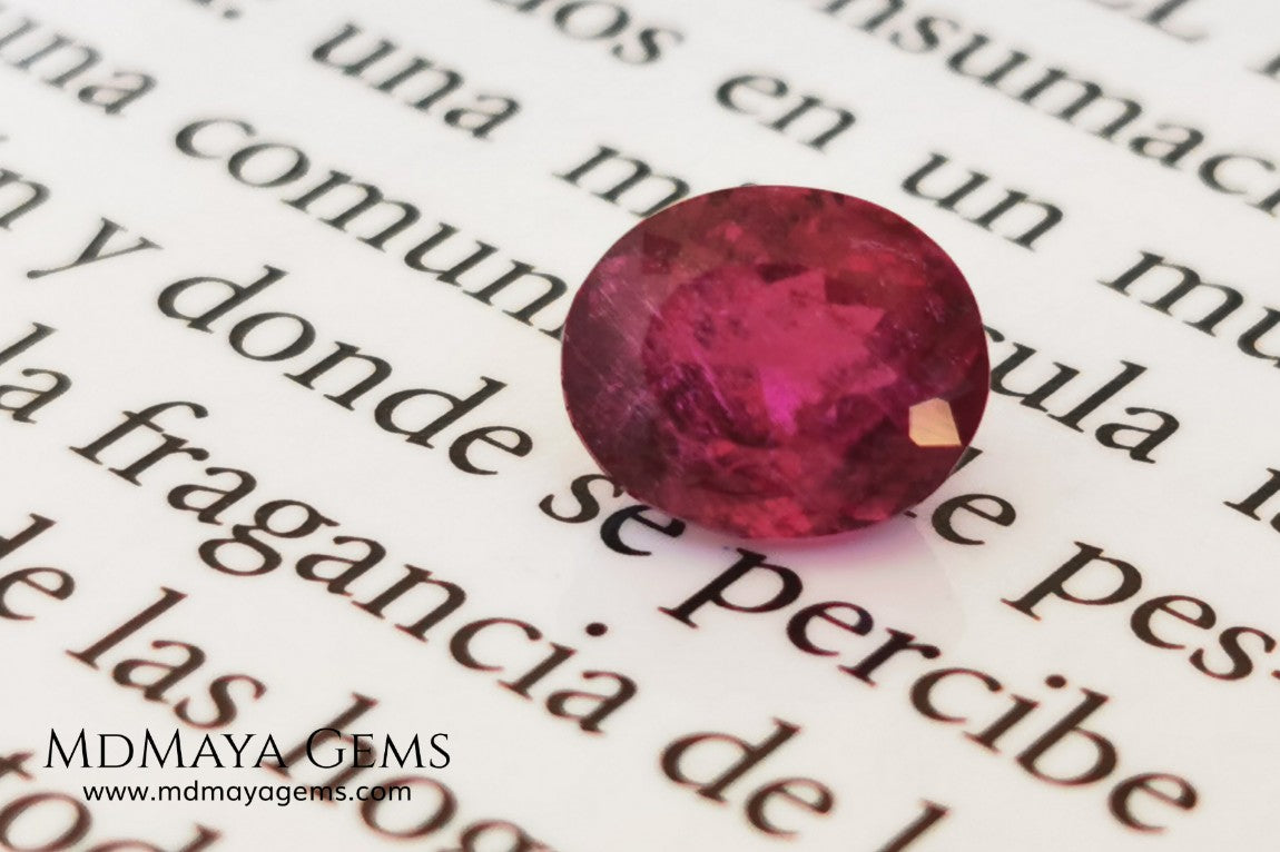 Purplish Red Rubellite Tourmaline. Oval Cut. 2.09 ct. This gem has some inclusions but these don't disturb the appearance of the gem, its color is rich and deep under daylight, is awesome!. It is ideal for a ring. 