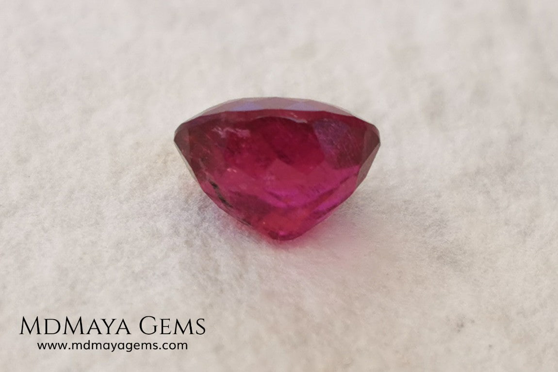 Purplish Red Rubellite Tourmaline. Oval Cut. 2.09 ct. This gem has some inclusions but these don't disturb the appearance of the gem, its color is rich and deep under daylight, is awesome!. It is ideal for a ring. 