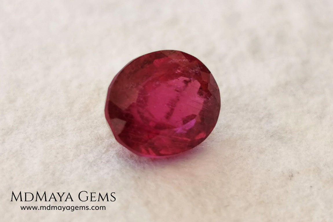 Purplish Red Rubellite Tourmaline. Oval Cut. 2.09 ct. This gem has some inclusions but these don't disturb the appearance of the gem, its color is rich and deep under daylight, is awesome!. It is ideal for a ring. 