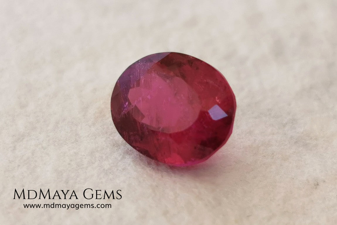 Purplish Red Rubellite Tourmaline. Oval Cut. 2.09 ct. This gem has some inclusions but these don't disturb the appearance of the gem, its color is rich and deep under daylight, is awesome!. It is ideal for a ring. 