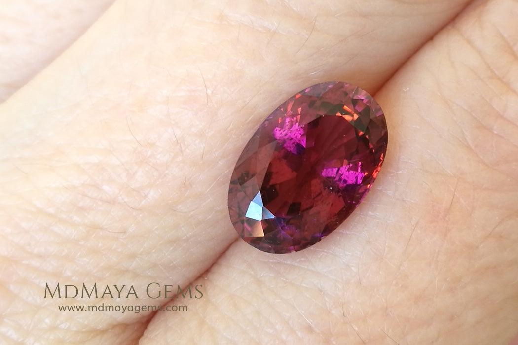 Untreated Rubellite. Oval Cut. 4.04 ct under daylight