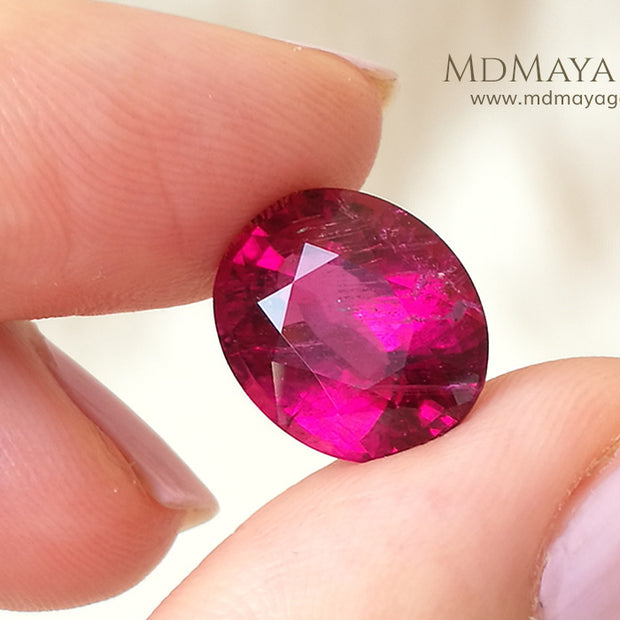 Untreated Rubellite African Tourmaline Oval Cut 5.96 ct under daylight