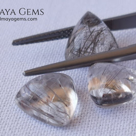 Metallic Rutilated Quartz 9.82 ct set. Outstanding set of rutilated quartz with beautiful inclusions. Perfect for your custom jewelry.  2.73 ct .. 9.93 * 9.83 * 4.73 mm 3.94 ct .. 10.23 * 10.35 * 5.80 mm 3.15 ct .. 9.93 * 9.72 * 5.39 mm