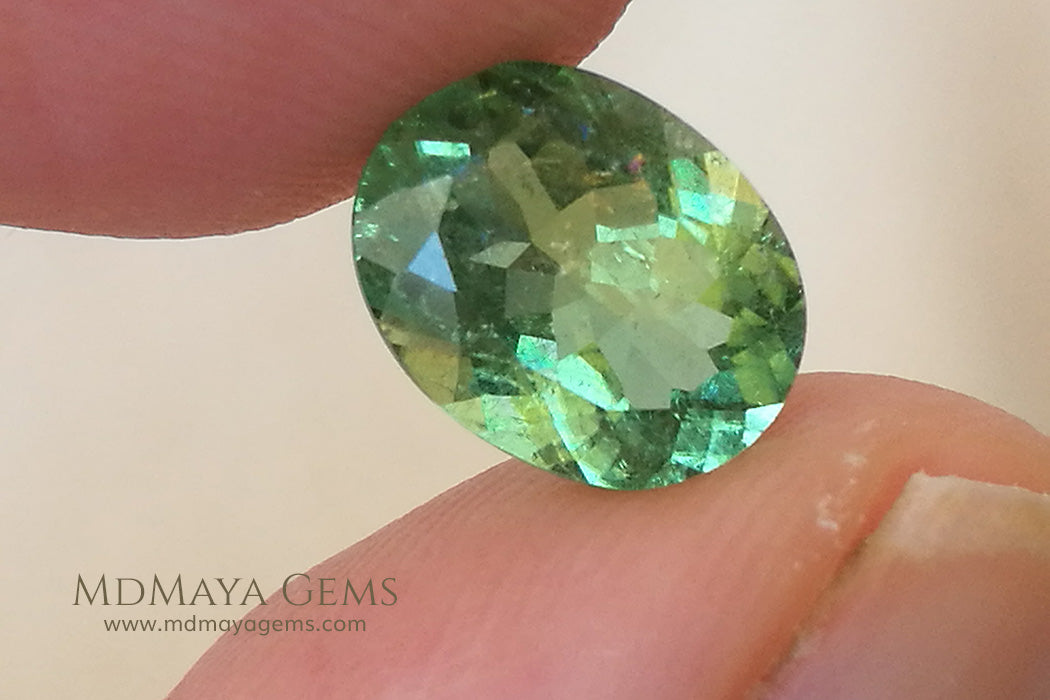 1.86 ct. .. 9.04 * 7.07 * 4.42 mm Green Paraiba Tourmaline 