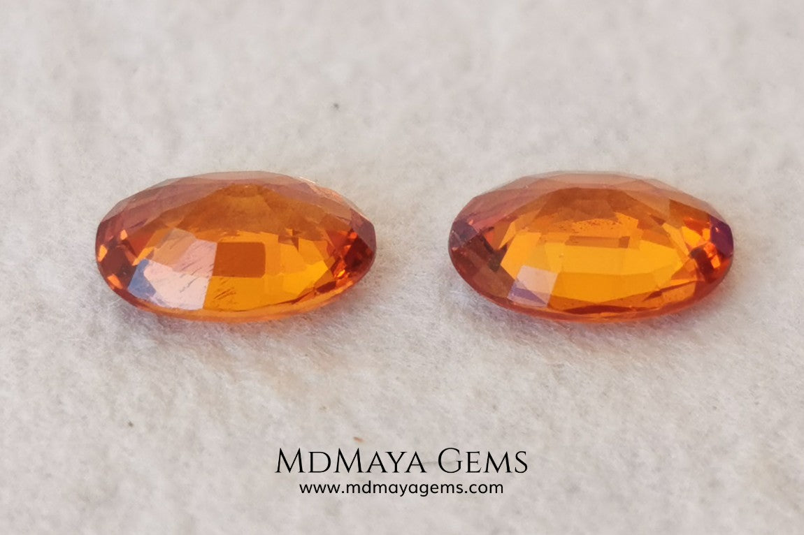 Stunning and Bright Orange Spessartite Garnets. Beautiful pair of natural and untreated gemstones, they will be superb on some earrings. They are full of life, they are pure orange