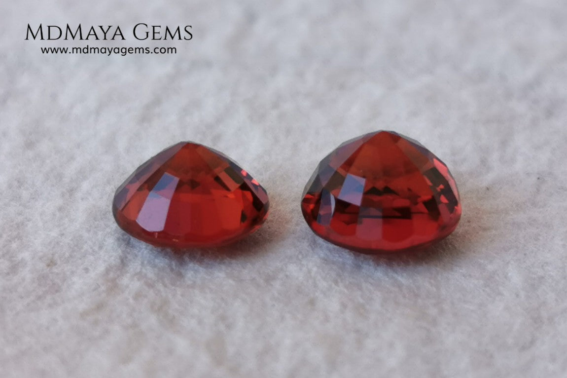 Dark Reddish Orange Spessartite Garnet Pair. 2.69 ct. Round cut. This pair of spessartites show a very saturated color and an incredible brightness, they will be amazing on some earrings. Pure color.