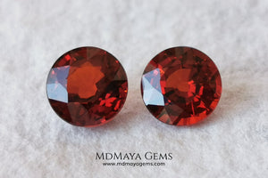 Dark Reddish Orange Spessartite Garnet Pair. 2.69 ct. Round cut. This pair of spessartites show a very saturated color and an incredible brightness, they will be amazing on some earrings. Pure color.