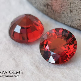 Dark Reddish Orange Spessartite Garnet Pair. 2.69 ct. Round cut. This pair of spessartites show a very saturated color and an incredible brightness, they will be amazing on some earrings. Pure color.