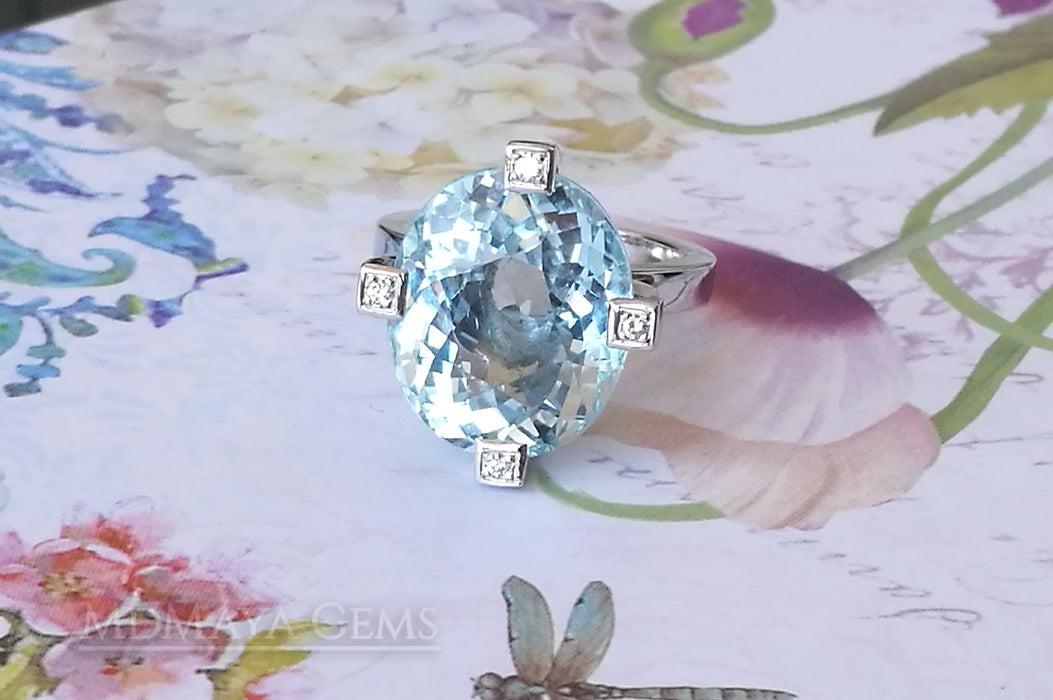 ﻿Luxury Light Blue Topaz and diamond ring in 18k white gold.  