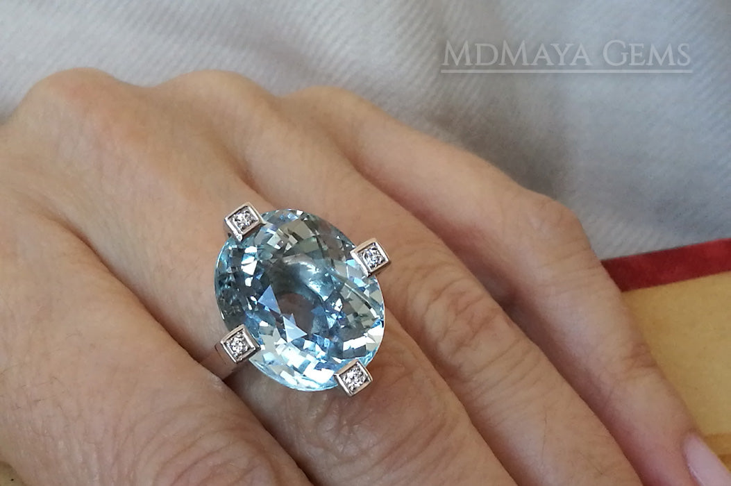 ﻿Luxury Light Blue Topaz and diamond ring in 18k white gold.  