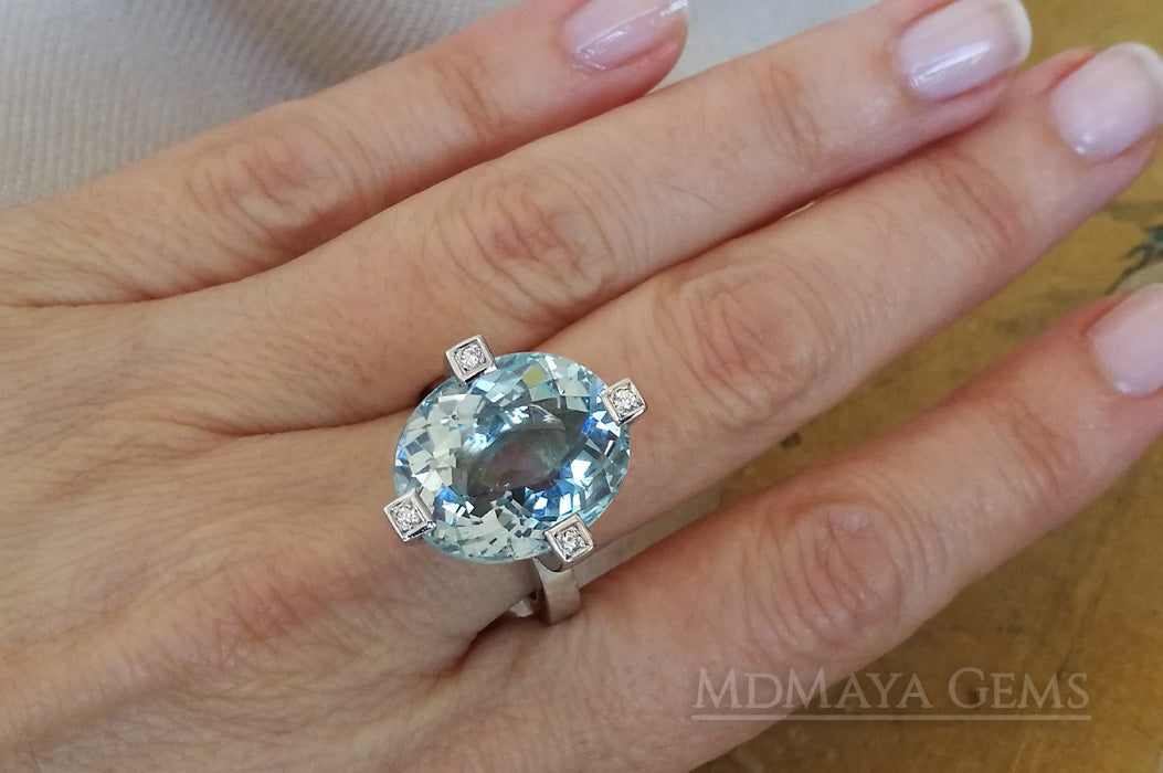 ﻿Luxury Light Blue Topaz and diamond ring in 18k white gold.  