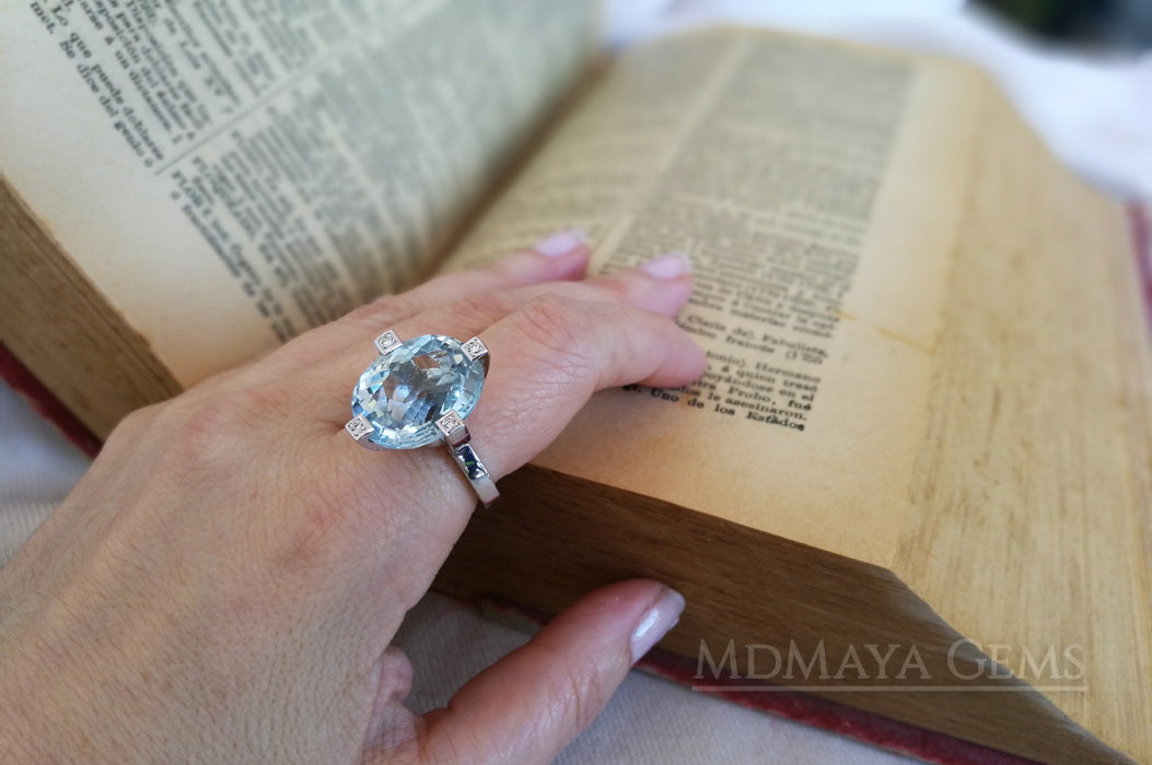 ﻿Luxury Light Blue Topaz and diamond ring in 18k white gold.  