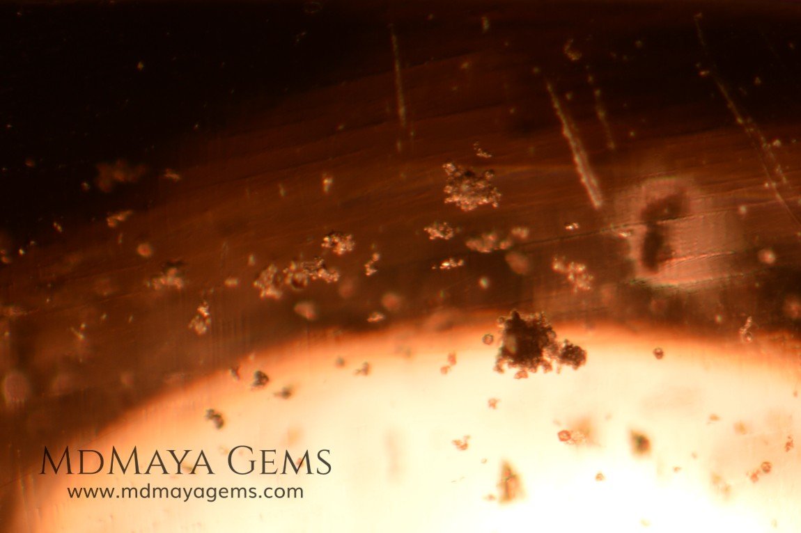 inclusions in Set Topazes from Utah. 27.46 ct total