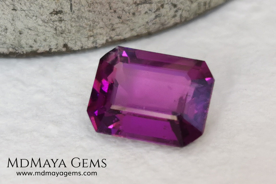 Vivid purple Umbalite (rhodolite garnet). Emerald cut. 2.15 ct.  Without a doubt this gemstone has the best of colors, it contains a very saturated purple color, under any light its behavior is amazing. This beauty comes from Tanzania and will be perfect in any piece of jewelry, it has good hardness, an acceptable size, the color is incredible and at a very affordable price. Without forgetting that it is a natural and untreated gem. Don't miss it.