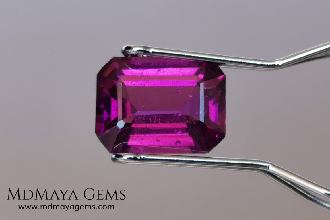 Vivid purple Umbalite (rhodolite garnet). Emerald cut. 2.15 ct.  Without a doubt this gemstone has the best of colors, it contains a very saturated purple color, under any light its behavior is amazing. This beauty comes from Tanzania and will be perfect in any piece of jewelry, it has good hardness, an acceptable size, the color is incredible and at a very affordable price. Without forgetting that it is a natural and untreated gem. Don't miss it.