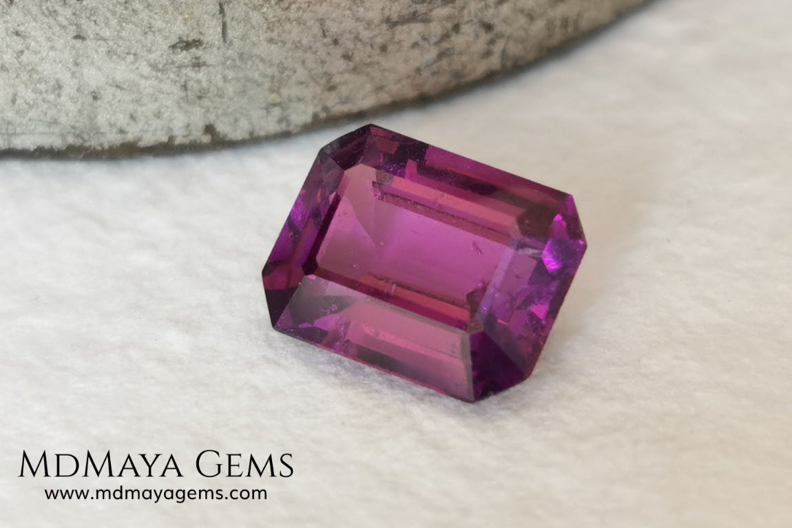 Vivid purple Umbalite (rhodolite garnet). Emerald cut. 2.15 ct.  Without a doubt this gemstone has the best of colors, it contains a very saturated purple color, under any light its behavior is amazing. This beauty comes from Tanzania and will be perfect in any piece of jewelry, it has good hardness, an acceptable size, the color is incredible and at a very affordable price. Without forgetting that it is a natural and untreated gem. Don't miss it.