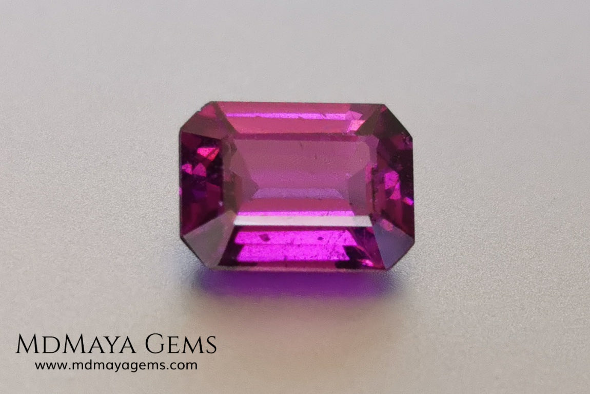 Vivid purple Umbalite (rhodolite garnet). Emerald cut. 2.15 ct.  Without a doubt this gemstone has the best of colors, it contains a very saturated purple color, under any light its behavior is amazing. This beauty comes from Tanzania and will be perfect in any piece of jewelry, it has good hardness, an acceptable size, the color is incredible and at a very affordable price. Without forgetting that it is a natural and untreated gem. Don't miss it.