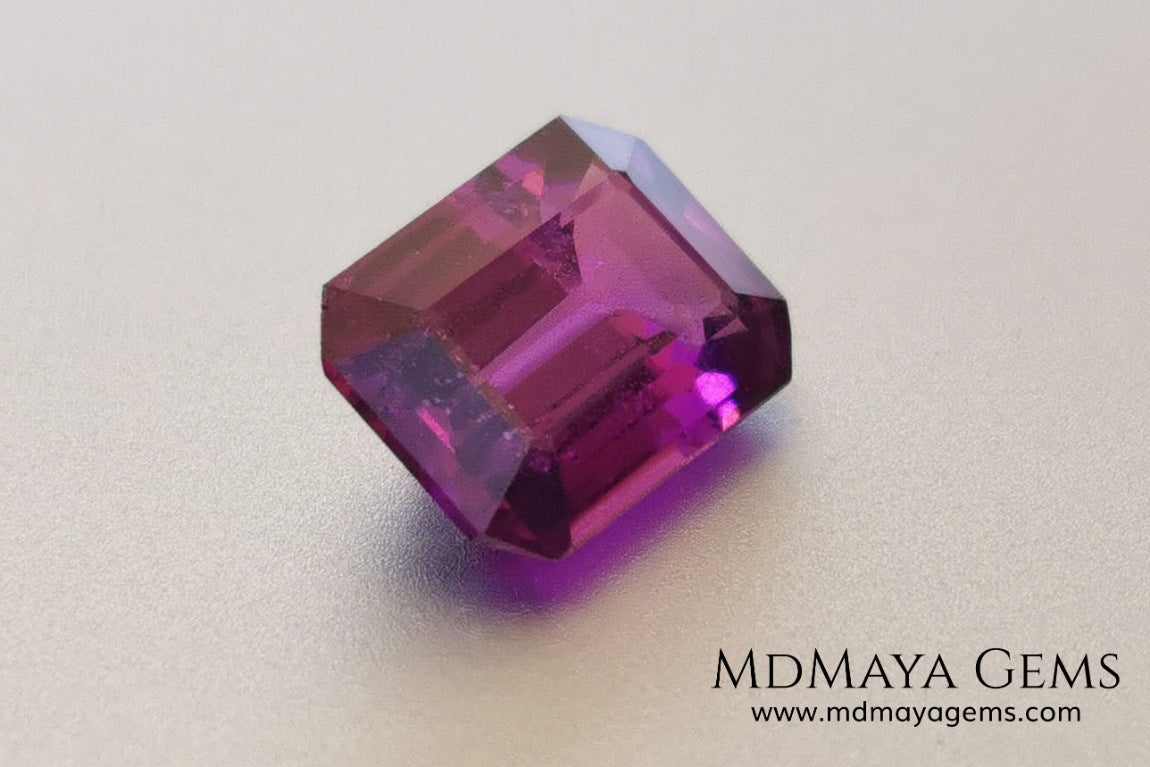 Vivid purple Umbalite (rhodolite garnet). Emerald cut. 2.15 ct.  Without a doubt this gemstone has the best of colors, it contains a very saturated purple color, under any light its behavior is amazing. This beauty comes from Tanzania and will be perfect in any piece of jewelry, it has good hardness, an acceptable size, the color is incredible and at a very affordable price. Without forgetting that it is a natural and untreated gem. Don't miss it.