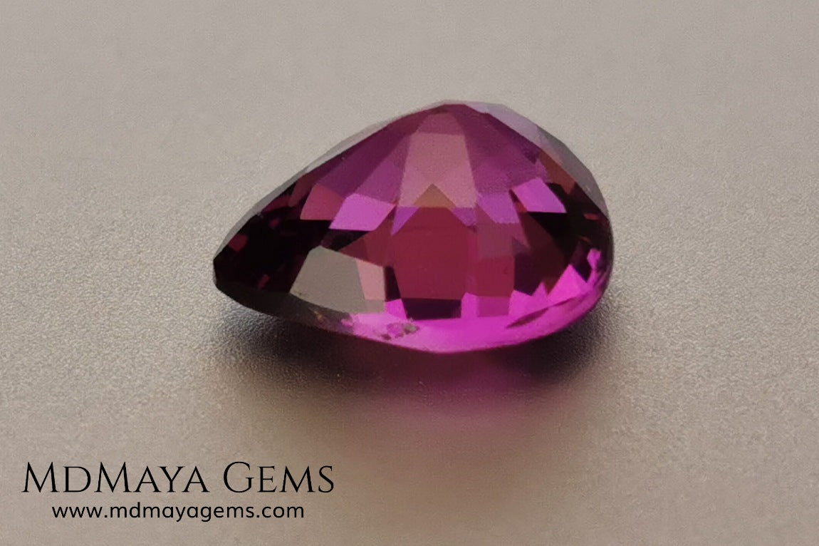 Umbalite 1.81 ct pear cut. This beautiful rhodolite garnet has the best color, a vivid and saturated purple full of bright and life, this gemstone will look really beautiful on a ring or any piece of jewelry that you design. A natural and untreated gem at the best price.