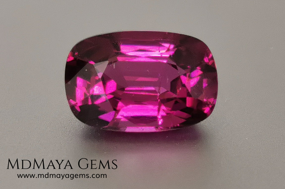 Reddish Purple Umbalite (Rhodolite Garnet), 2.03 ct, cushion cut. Elegant natural gemstone, that shows a vivid color, good cut and proportions, it will look very pretty in a ring, and at an affordable price.
