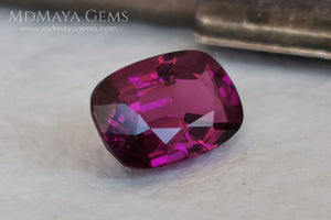 Reddish Purple Umbalite (Rhodolite Garnet), 2.03 ct, cushion cut. Elegant natural gemstone, that shows a vivid color, good cut and proportions, it will look very pretty in a ring, and at an affordable price.