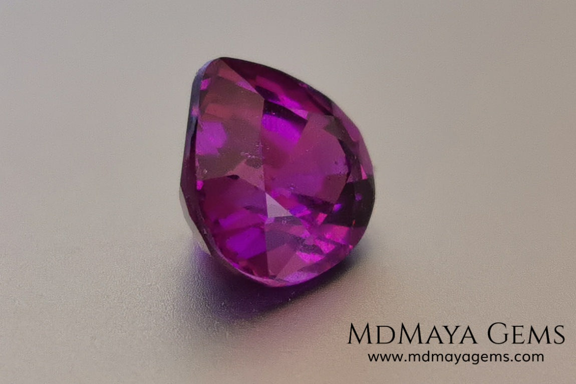 Vivid Purple Umbalite (Rhodolite Garnet), 2.36 ct, pear cut. This natural and untreated gemstone has the best of colors, its intense purple as well as its good quality of size and proportions, make it an ideal gem to mount in any type of jewelry and at a very affordable price.