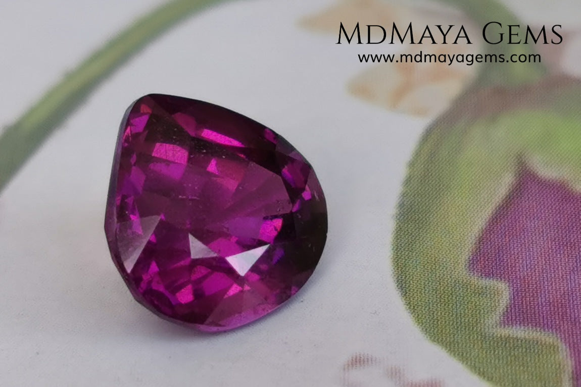 Vivid Purple Umbalite (Rhodolite Garnet), 2.36 ct, pear cut. This natural and untreated gemstone has the best of colors, its intense purple as well as its good quality of size and proportions, make it an ideal gem to mount in any type of jewelry and at a very affordable price.