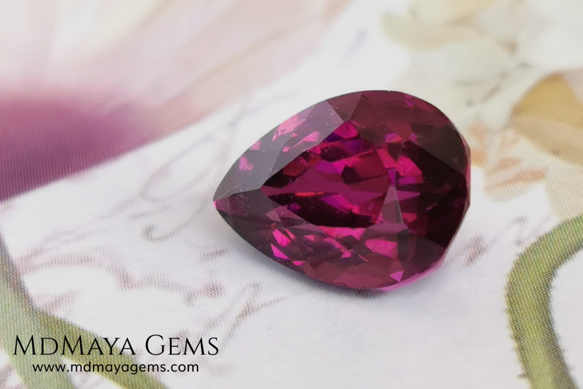 Vivid reddish purple Umbalite (Rhodolite Garnet) 3.15 ct, pear cut. Beautiful and untreated gemstone that shows a saturated color, it will look perfect in any piece of jewelry.