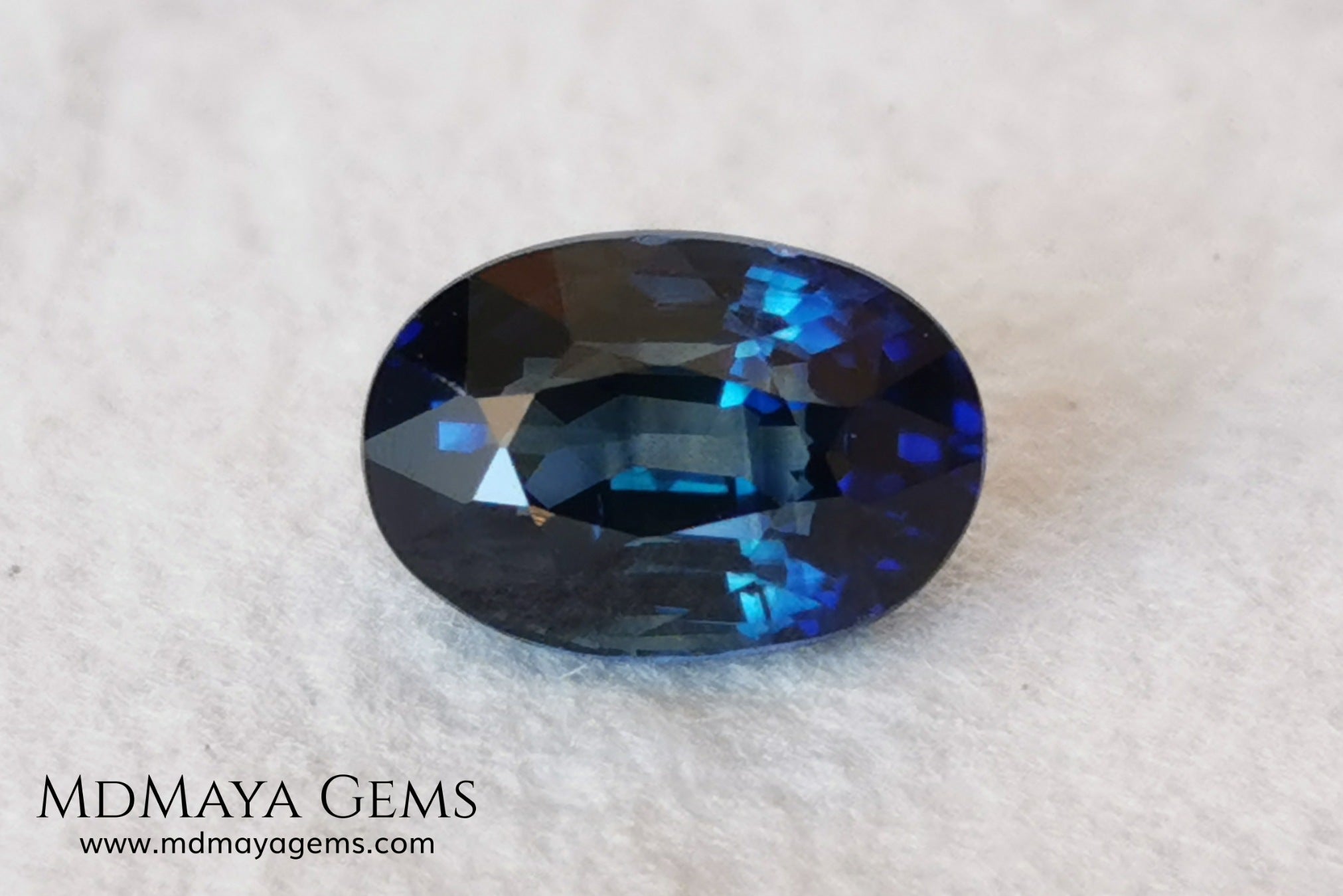  Untreated indigo blue sapphire 1.52, oval cut, certificate included.  This dark blue sapphire shows two shades of blue, one more vivid in the center of the gem and darker at the ends, its behavior under light is good, both in incandescent light and under natural light, it is a dark blue sapphire full of sparkles and life. Its elongated oval cut will be very beautiful in any piece of jewelry. This sapphire is ideal for those looking for untreated gemstones of any kind at a good price. 