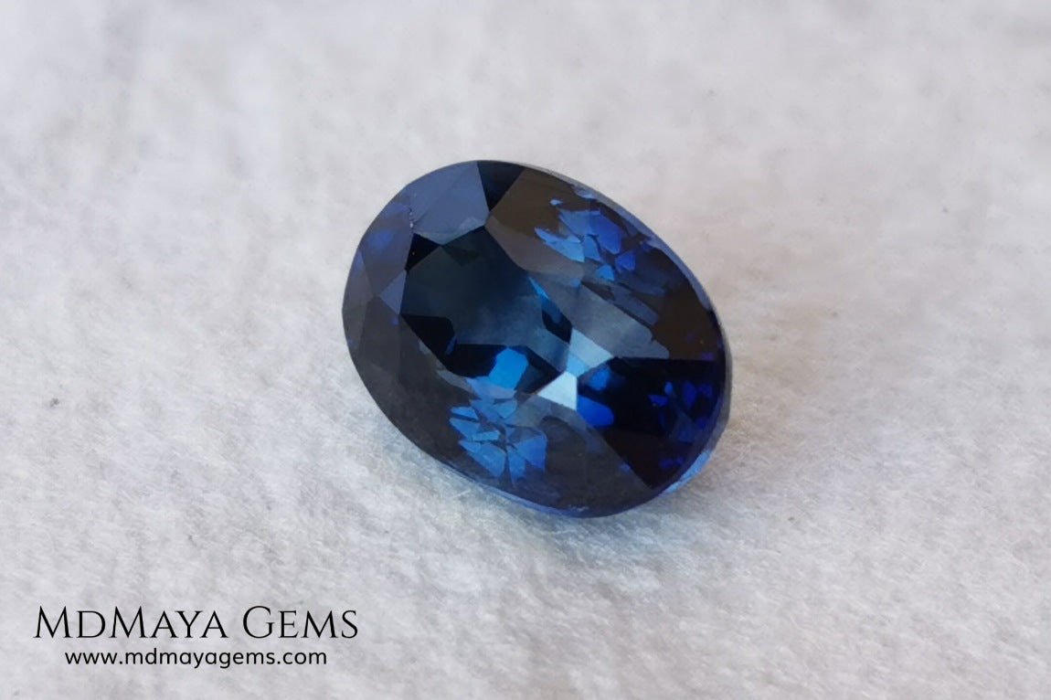  Untreated indigo blue sapphire 1.52, oval cut, certificate included.  This dark blue sapphire shows two shades of blue, one more vivid in the center of the gem and darker at the ends, its behavior under light is good, both in incandescent light and under natural light, it is a dark blue sapphire full of sparkles and life. Its elongated oval cut will be very beautiful in any piece of jewelry. This sapphire is ideal for those looking for untreated gemstones of any kind at a good price. 