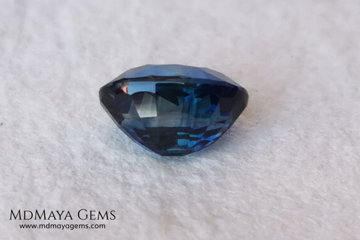  Untreated indigo blue sapphire 1.52, oval cut, certificate included.  This dark blue sapphire shows two shades of blue, one more vivid in the center of the gem and darker at the ends, its behavior under light is good, both in incandescent light and under natural light, it is a dark blue sapphire full of sparkles and life. Its elongated oval cut will be very beautiful in any piece of jewelry. This sapphire is ideal for those looking for untreated gemstones of any kind at a good price. 