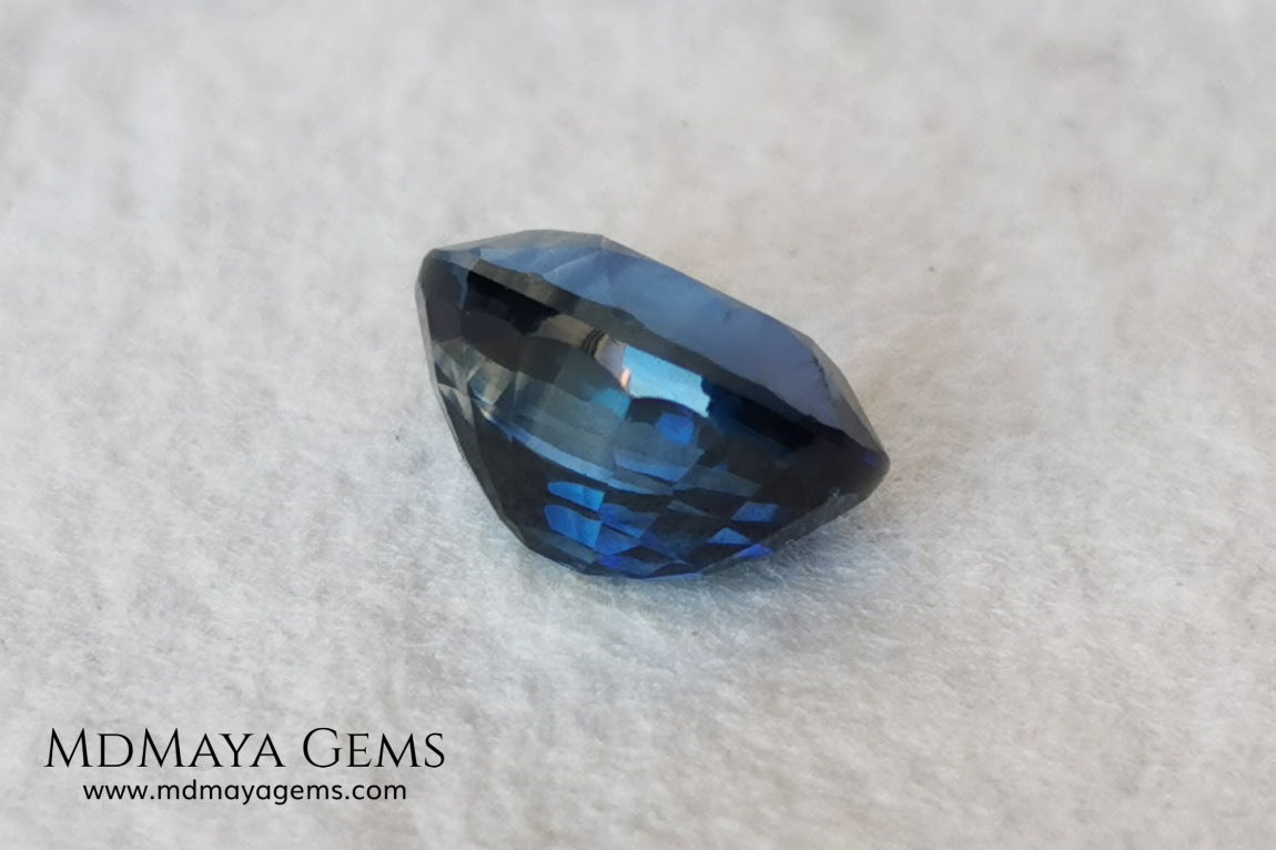  Untreated indigo blue sapphire 1.52, oval cut, certificate included.  This dark blue sapphire shows two shades of blue, one more vivid in the center of the gem and darker at the ends, its behavior under light is good, both in incandescent light and under natural light, it is a dark blue sapphire full of sparkles and life. Its elongated oval cut will be very beautiful in any piece of jewelry. This sapphire is ideal for those looking for untreated gemstones of any kind at a good price. 