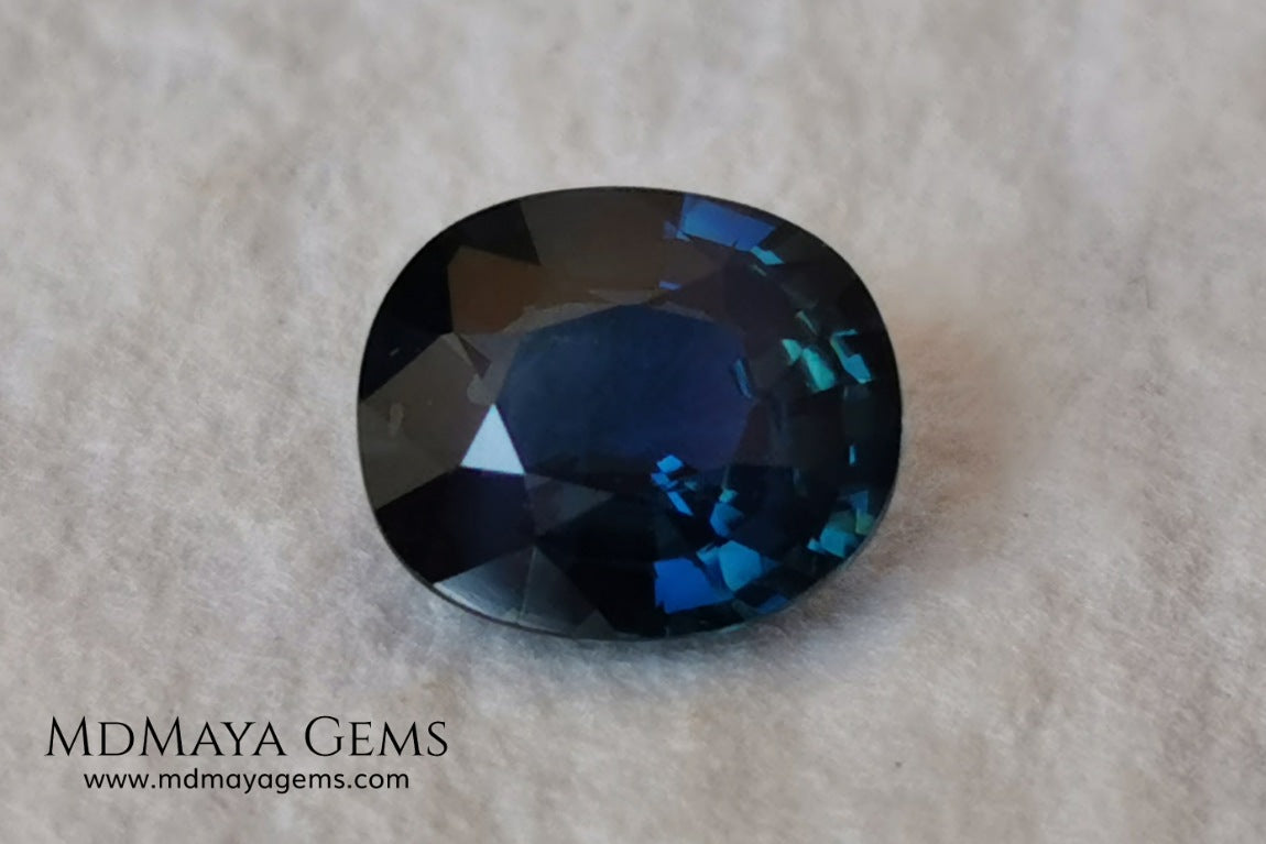 Untreated dark greenish blue sapphire 1.75 ct. Oval cut.  Amazing dark greenish blue sapphire with a good behavior under any type of light. It has a good size, and it will look perfect on your personalized jewelry, either in a ring or a pendant. It has some inclusions that although they are visible from some angles, they do not affect its beautiful at all. This amazing sapphire is ideal for those who look for precious stones without treatment of any kind.