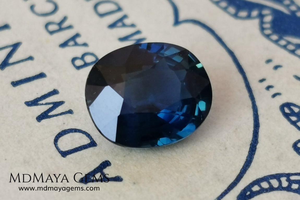 Untreated dark greenish blue sapphire 1.75 ct. Oval cut.  Amazing dark greenish blue sapphire with a good behavior under any type of light. It has a good size, and it will look perfect on your personalized jewelry, either in a ring or a pendant. It has some inclusions that although they are visible from some angles, they do not affect its beautiful at all. This amazing sapphire is ideal for those who look for precious stones without treatment of any kind.