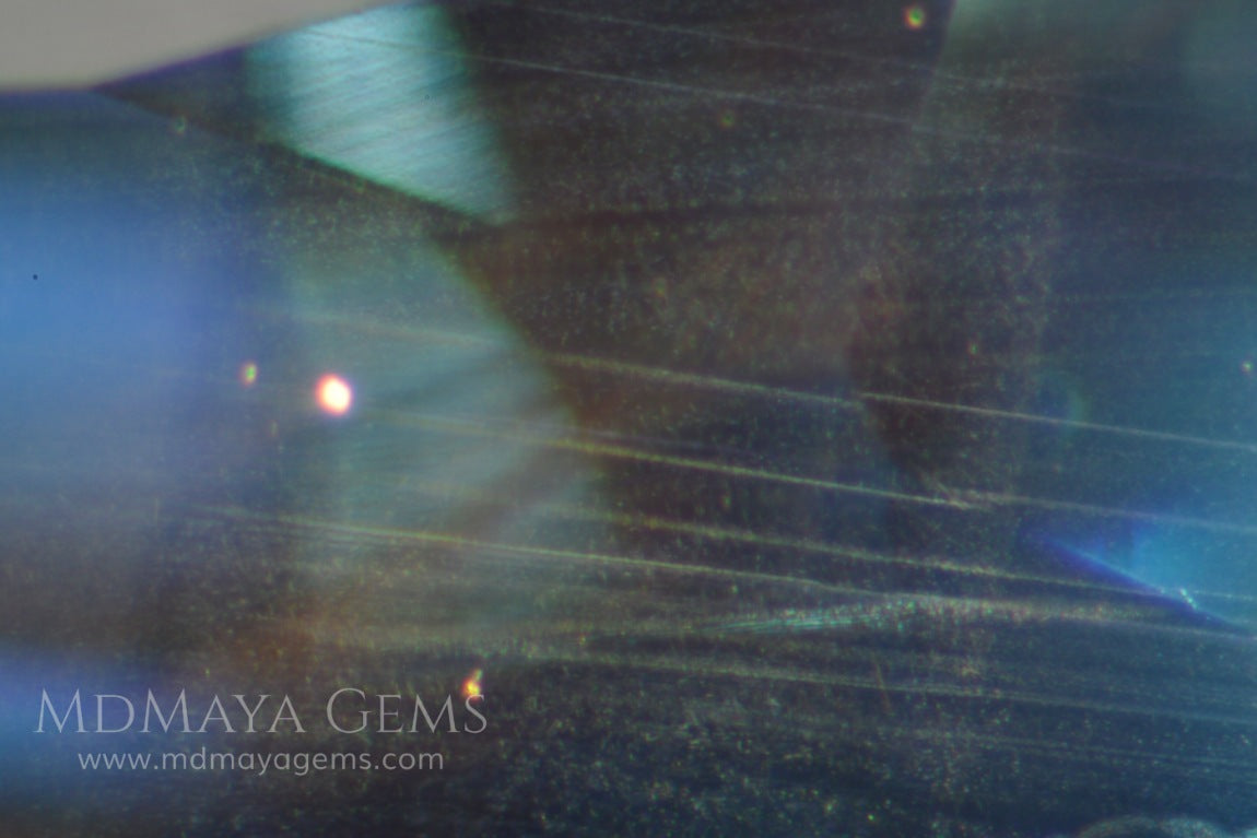 Inclusions in untreated greenish blue sapphire 1.75 ct