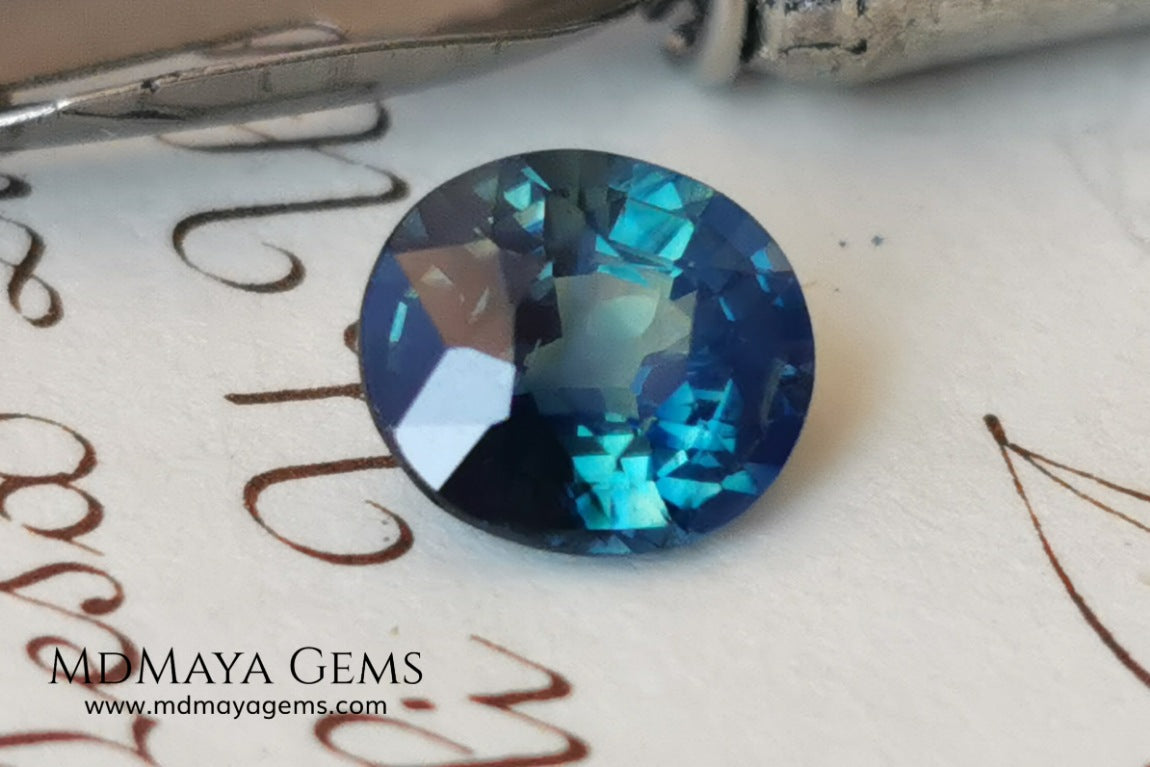 Untreated Greenish Blue Sapphire 1.79 ct, oval cut with certificate.  This greenish-blue sapphire has a very good behavior under any type of light, whether under incandescent or natural light. It has a cloudy zone, which can be seen in the photos, although it is really very beautiful gemstone, it has a very good size for a ring or any piece of jewelry. A great untreated blue sapphire at an affordable price. 