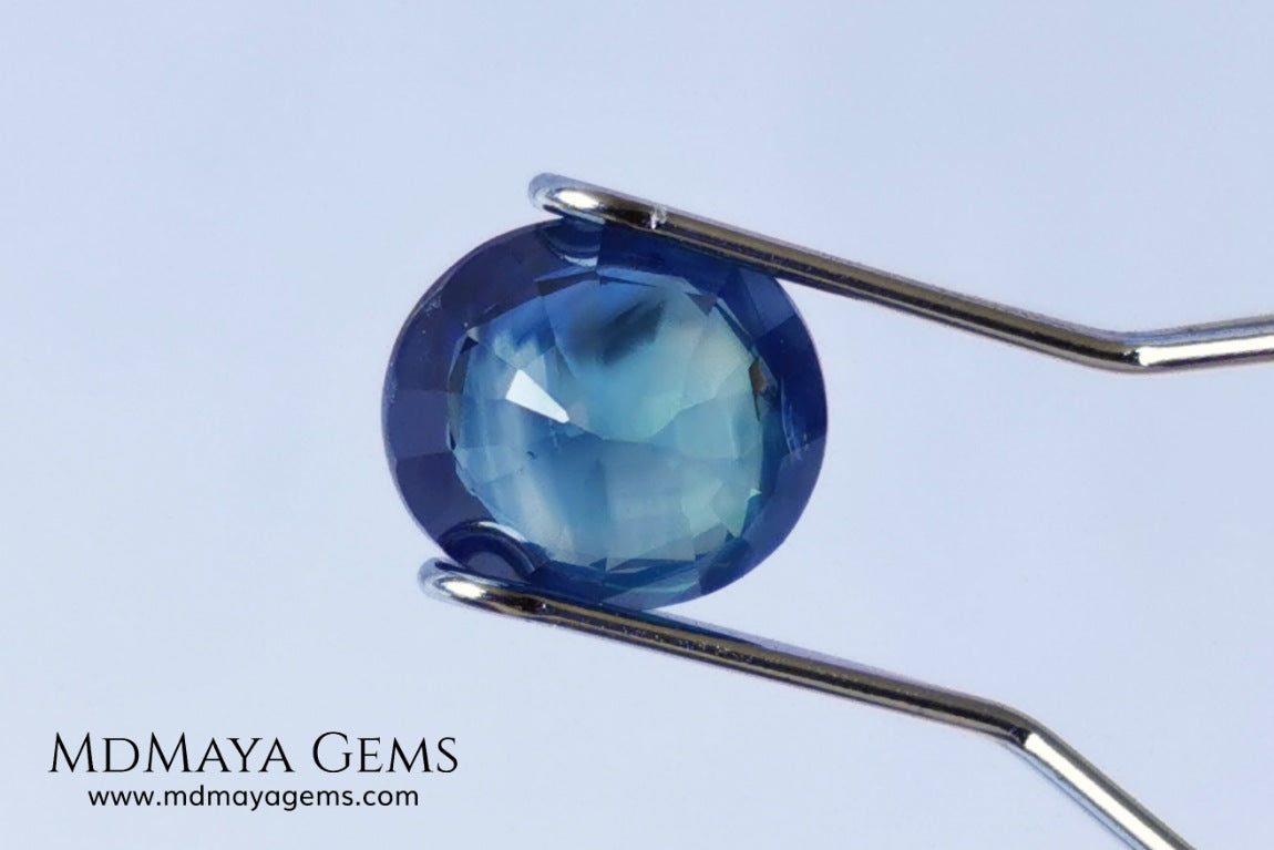 Untreated Greenish Blue Sapphire 1.79 ct, oval cut with certificate.  This greenish-blue sapphire has a very good behavior under any type of light, whether under incandescent or natural light. It has a cloudy zone, which can be seen in the photos, although it is really very beautiful gemstone, it has a very good size for a ring or any piece of jewelry. A great untreated blue sapphire at an affordable price. 