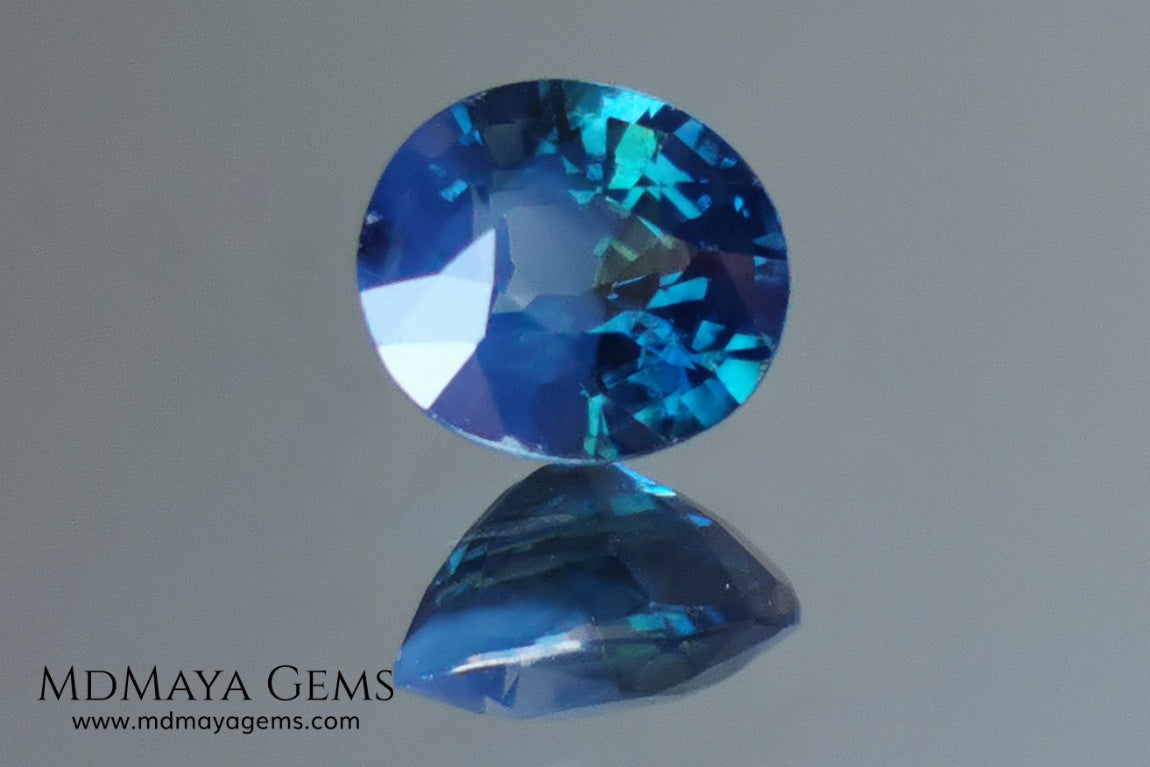 Untreated Greenish Blue Sapphire 1.79 ct, oval cut with certificate.  This greenish-blue sapphire has a very good behavior under any type of light, whether under incandescent or natural light. It has a cloudy zone, which can be seen in the photos, although it is really very beautiful gemstone, it has a very good size for a ring or any piece of jewelry. A great untreated blue sapphire at an affordable price. 
