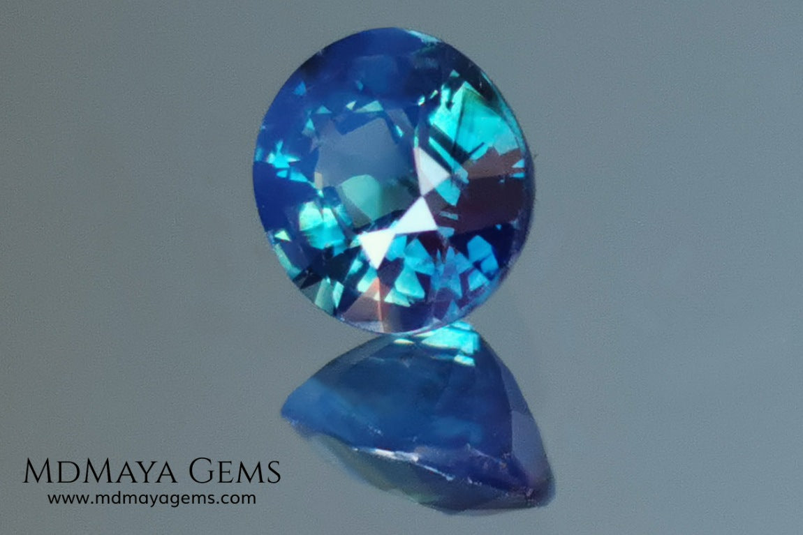 Untreated Greenish Blue Sapphire 1.79 ct, oval cut with certificate.  This greenish-blue sapphire has a very good behavior under any type of light, whether under incandescent or natural light. It has a cloudy zone, which can be seen in the photos, although it is really very beautiful gemstone, it has a very good size for a ring or any piece of jewelry. A great untreated blue sapphire at an affordable price. 