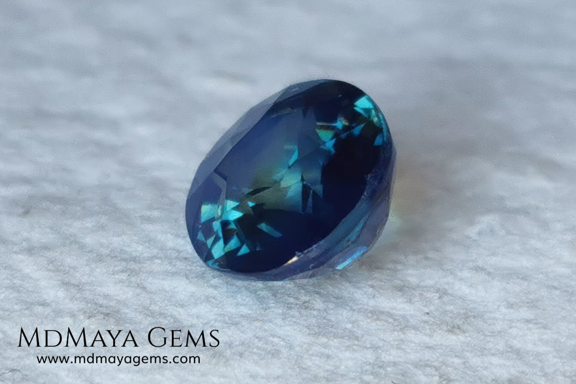 Untreated Greenish Blue Sapphire 1.79 ct, oval cut with certificate.  This greenish-blue sapphire has a very good behavior under any type of light, whether under incandescent or natural light. It has a cloudy zone, which can be seen in the photos, although it is really very beautiful gemstone, it has a very good size for a ring or any piece of jewelry. A great untreated blue sapphire at an affordable price. 